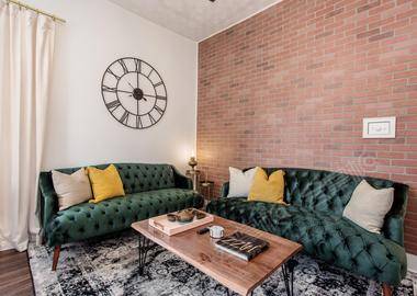 Midcentury Modern Charmer with Brick Accent Backdrop